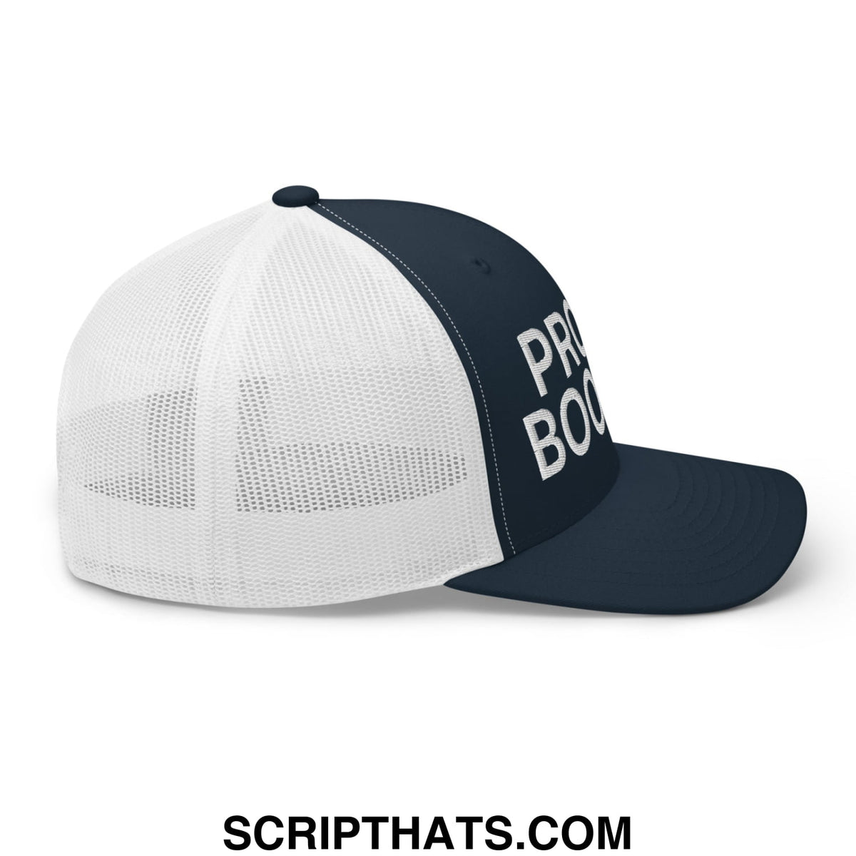 A navy blue and white mesh trucker hat with pro book embroidered in bold white letters on front panel