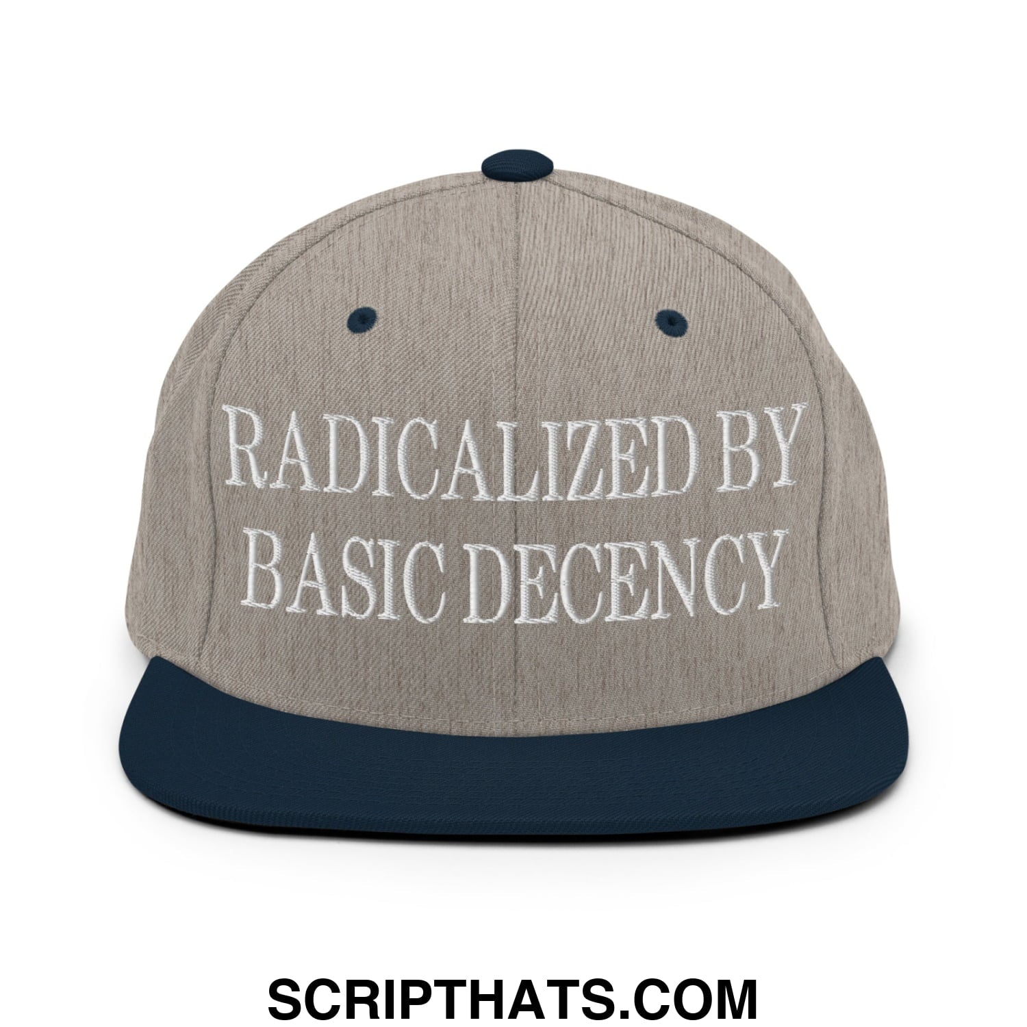 A beige and navy blue snapback hat with white embroidered text radicalized by basic decency on the front panel