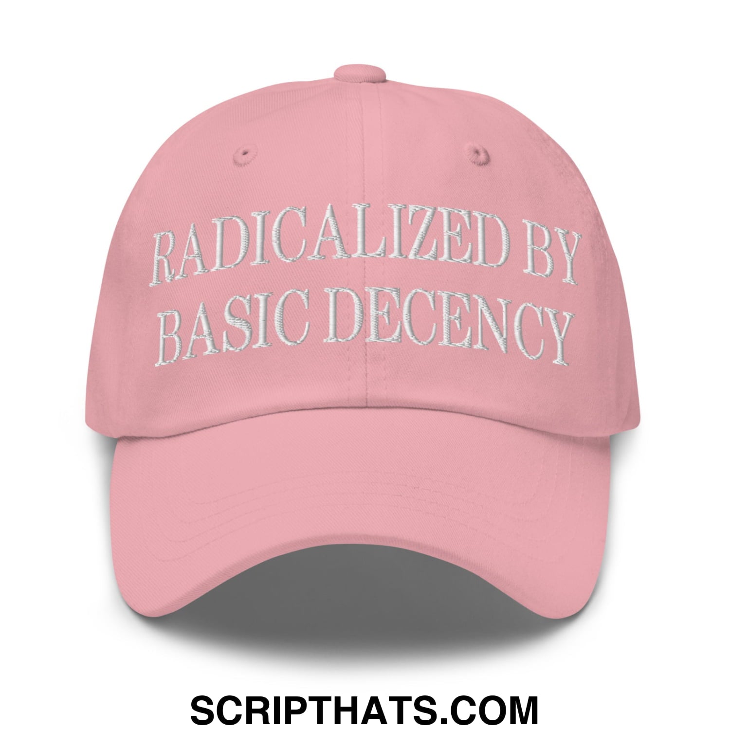 A soft pink unstructured dad hat with white embroidered text radicalized by basic decency on the front
