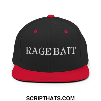 Black snapback hat with red brim and button featuring white embroidered rage bait text on the front