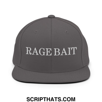 A dark gray flat bill snapback hat with rage bait embroidered in white thread across the front panel