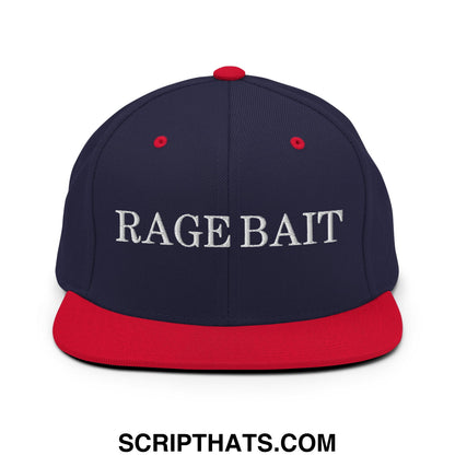 Navy blue and red snapback hat with white embroidered rage bait text and flat bill brim design