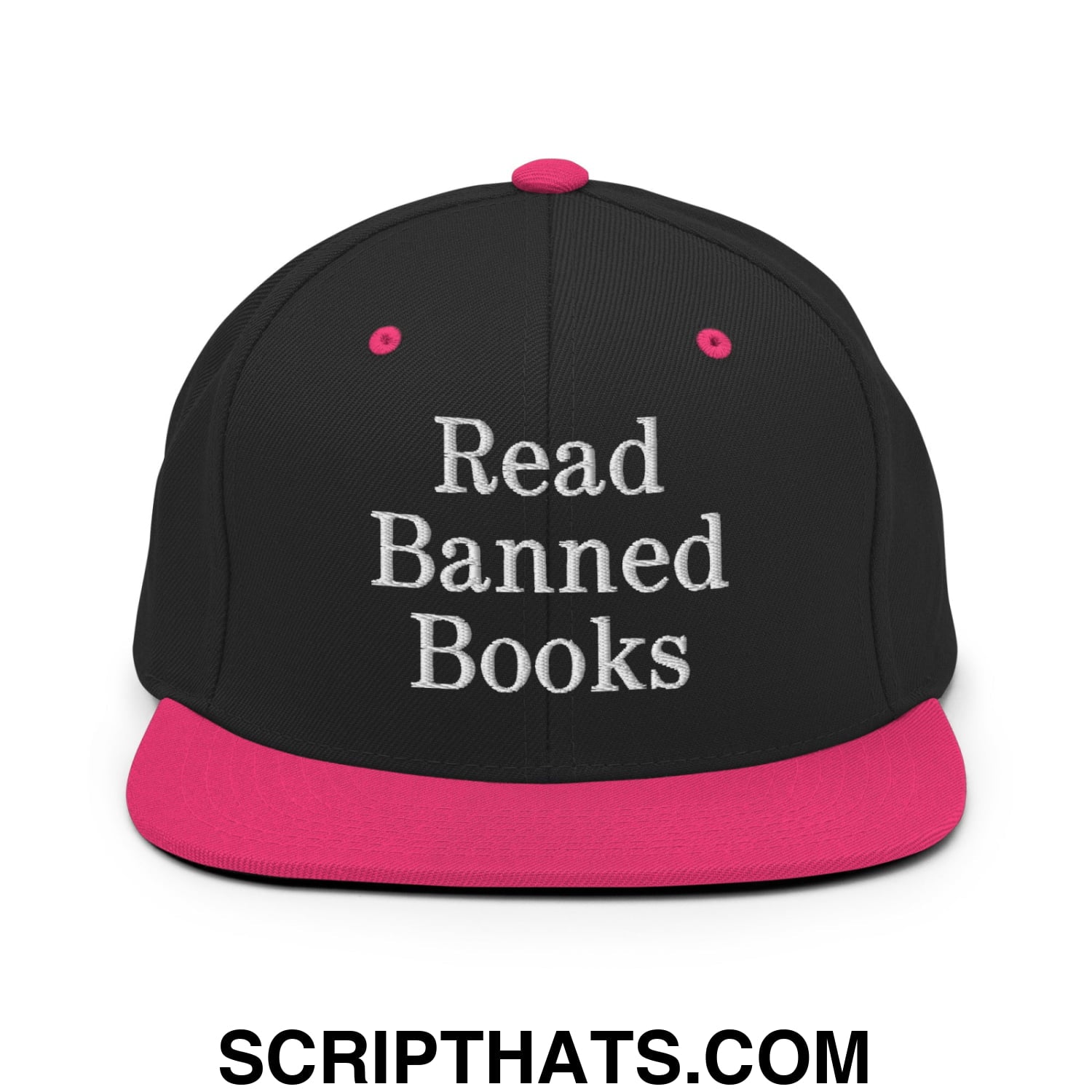 Black snapback hat with vibrant pink brim and button embroidered with read banned books in white