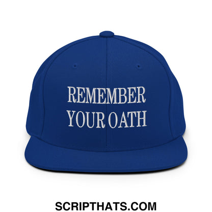 Royal blue snapback hat with white embroidered remember your oath text and flat bill brim for casual wear