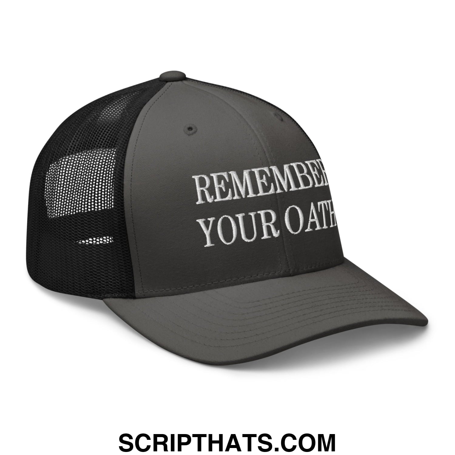 Dark gray trucker hat with black mesh back and white embroidered text remember your oath on front panel