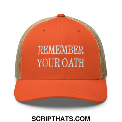 Orange mesh trucker hat with beige mesh back and white embroidered text reading remember your oath