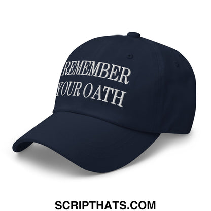 Navy blue unstructured dad hat with white embroidered text reading remember your oath in a casual style