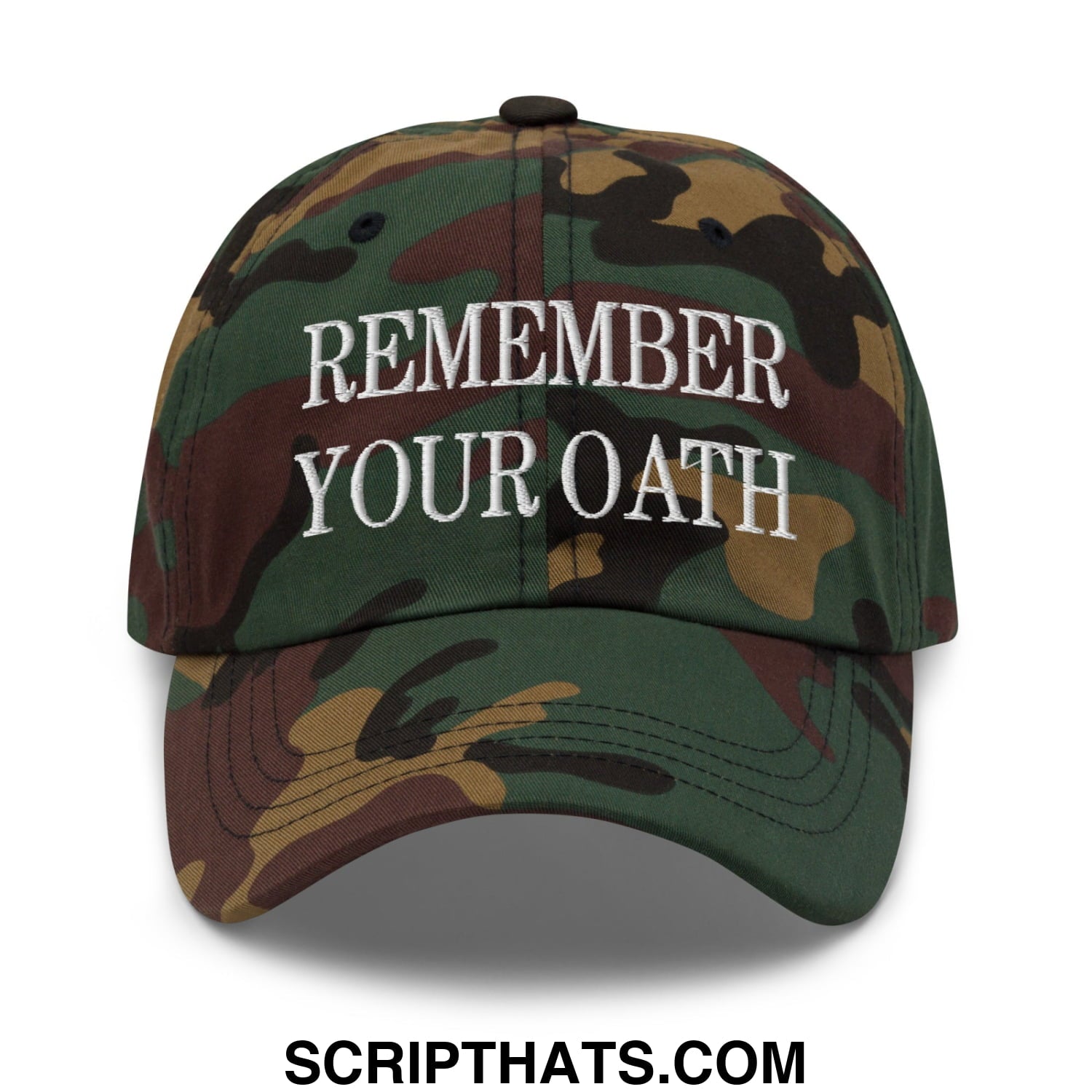 A camouflage unstructured dad hat with white embroidered text reading remember your oath on the front
