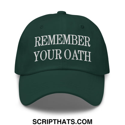 Dark green unstructured dad hat with white embroidered text remember your oath on the front panel