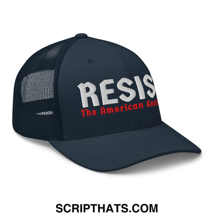Dark navy mesh trucker hat with embroidered white and red resist the american gestapo text on the front