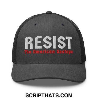 Black mesh trucker hat with embroidered white and red resist the american gestapo text on front panel