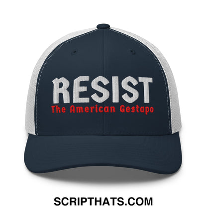 Dark blue and white mesh trucker hat embroidered with resist in bold white above red the american gestapo text
