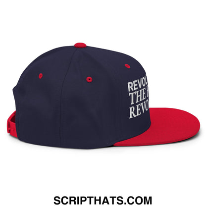Navy blue and red snapback cap with white embroidered revolt the revolution text from the french revolution collection