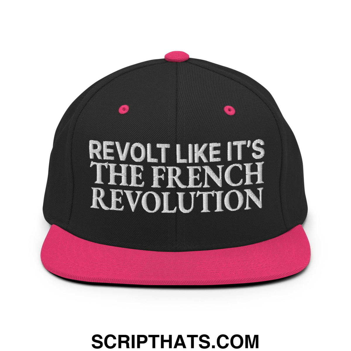 Black snapback cap with vibrant pink brim and button featuring white embroidered text revolt like it’s the french revolution
