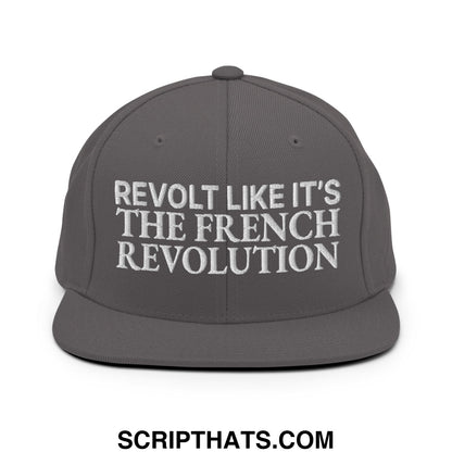 Gray snapback hat with white embroidered text reading revolt like it is the french revolution on the front