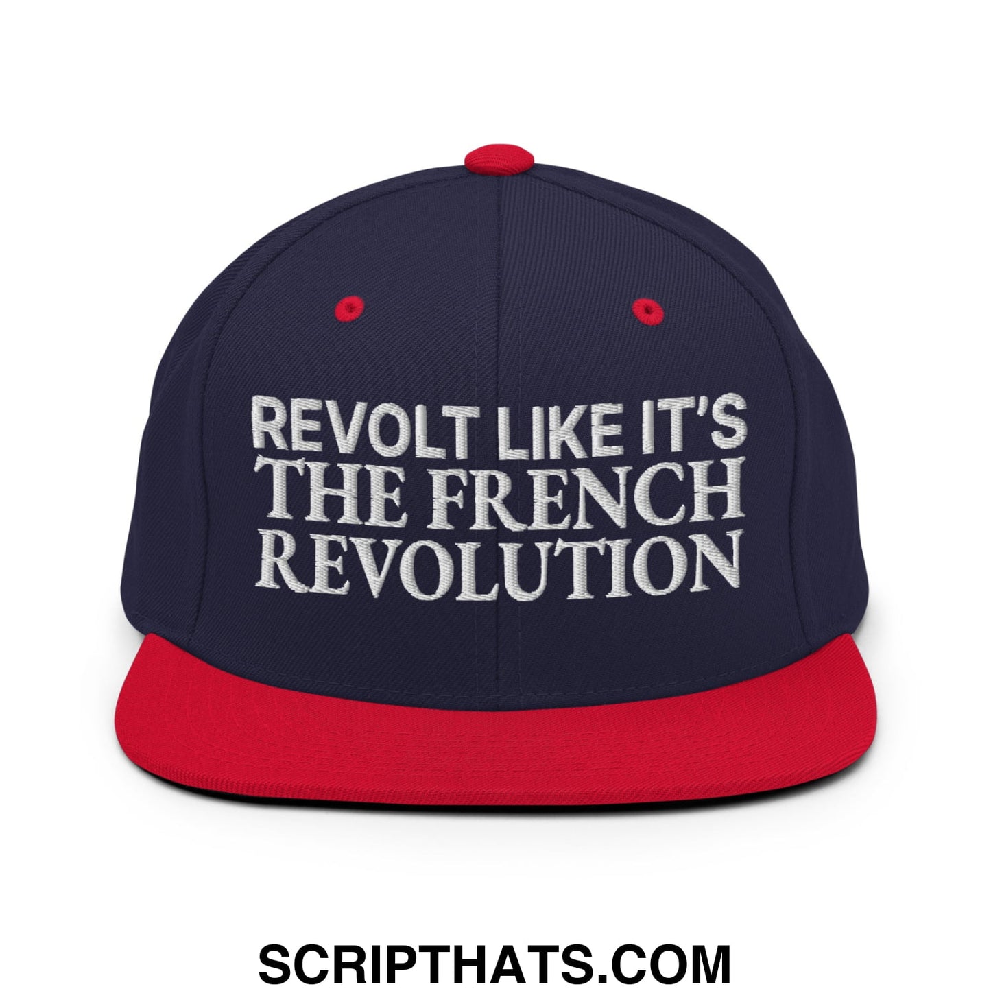 Navy blue and red snapback hat with white embroidered text revolt like it’s the french revolution on flat bill brim