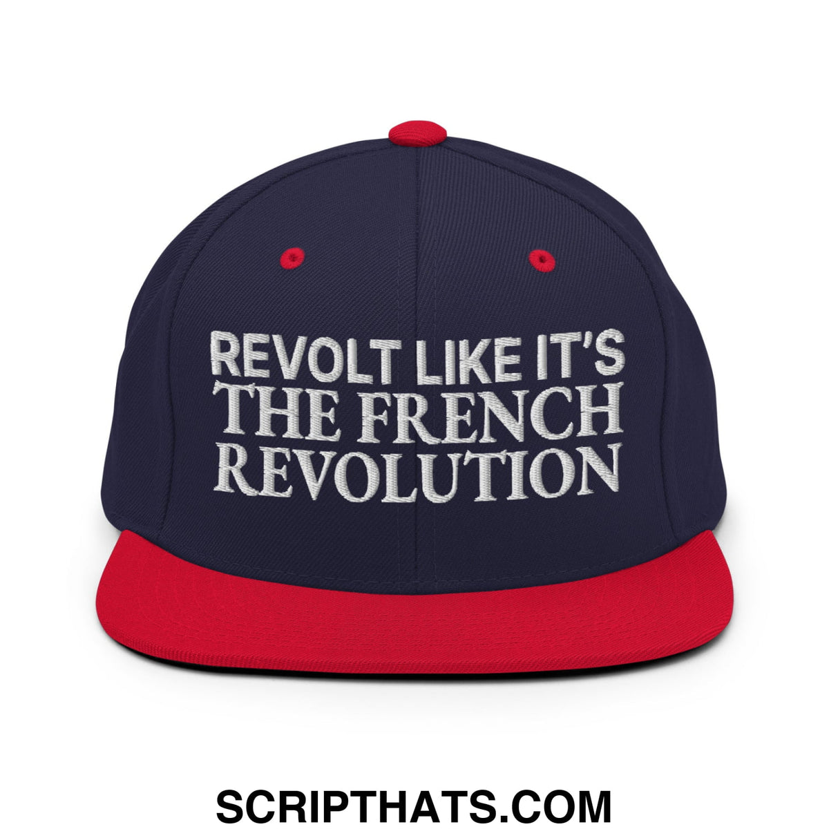 Navy blue and red snapback hat with white embroidered text revolt like it’s the french revolution on flat bill brim