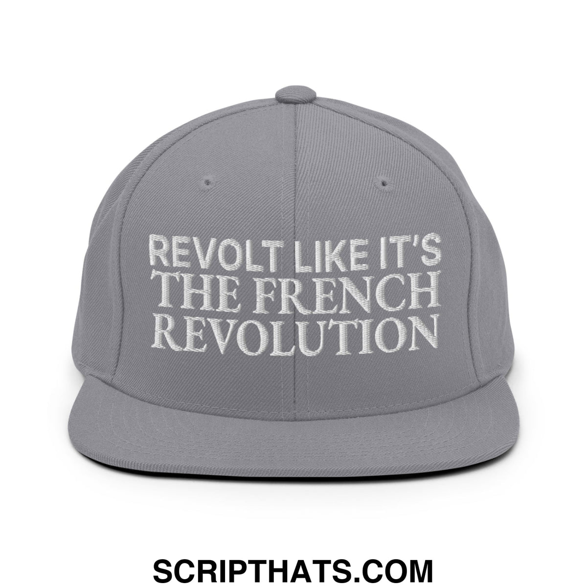 Gray snapback hat with white embroidered text reading revolt like it’s the french revolution flat bill brim design