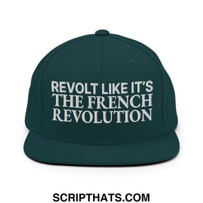 Dark green snapback hat with white embroidered text reading revolt like it’s the french revolution on the front