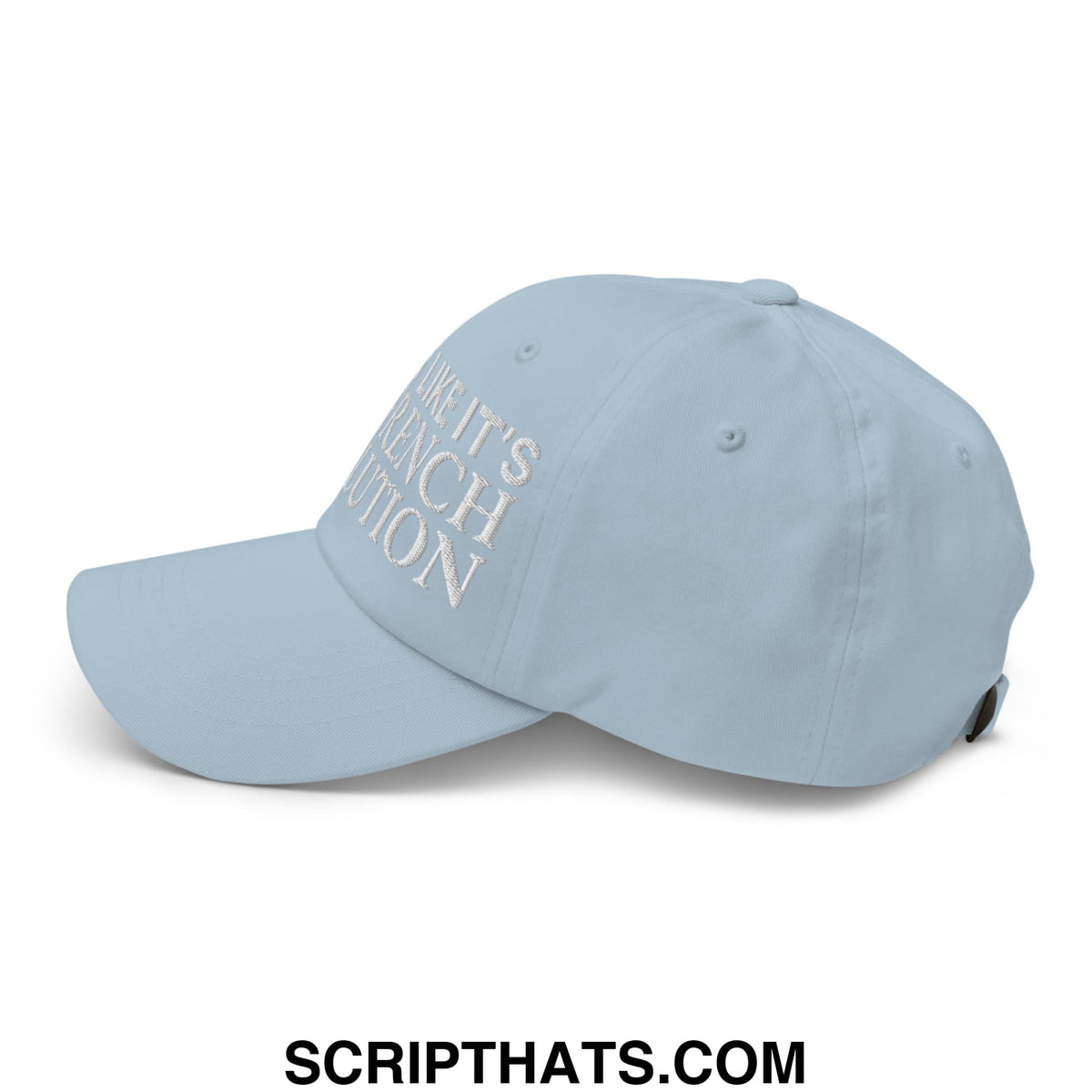 Light blue unstructured dad hat with white embroidered think its the french revolution text for casual wear
