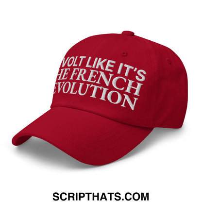 Red unstructured dad hat with white embroidered text revolt like it is the french revolution for casual wear