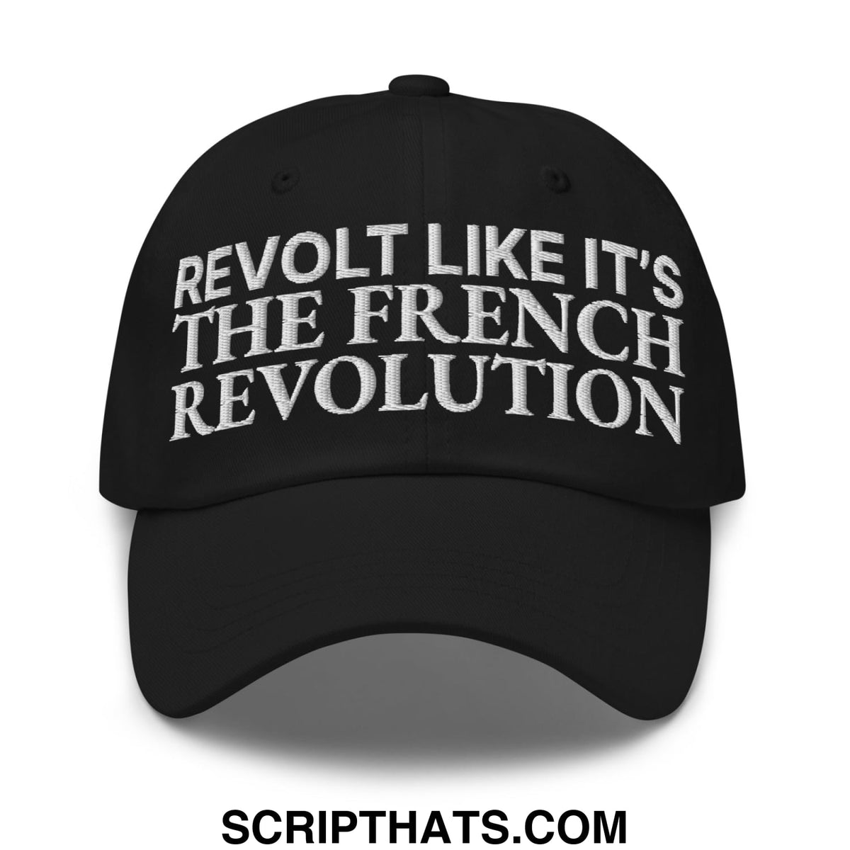 Black unstructured dad hat with white embroidered text reading revolt like it’s the french revolution