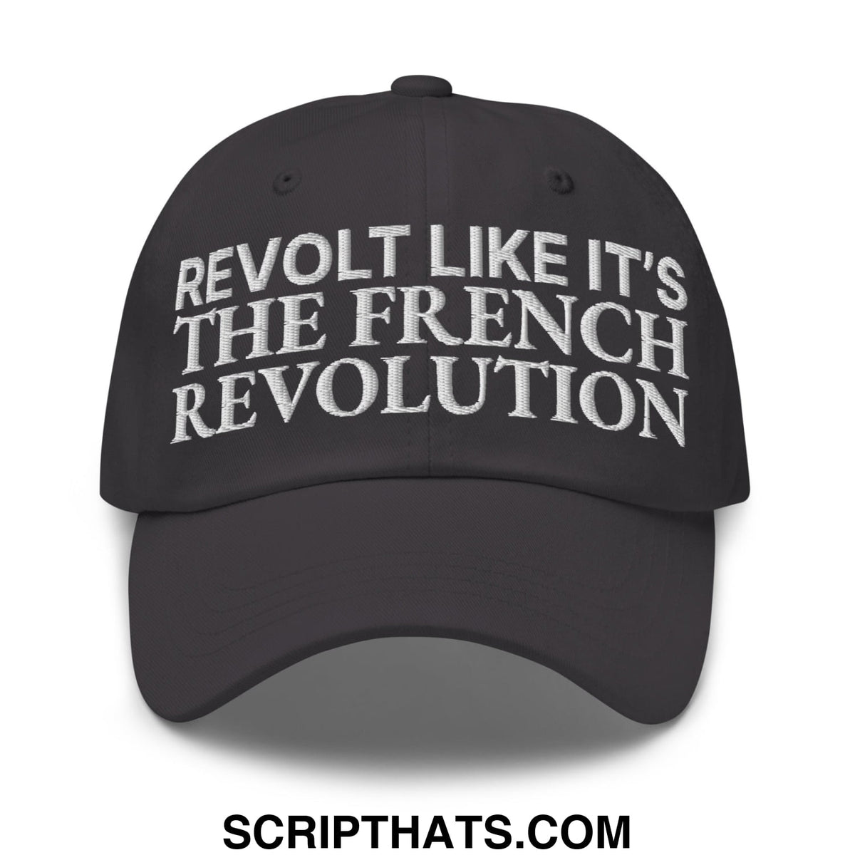 Black unstructured dad hat with white embroidered text reading revolt like it’s the french revolution