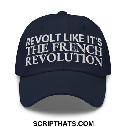 Navy blue unstructured dad hat with white embroidered text reading revolt like it’s the french revolution