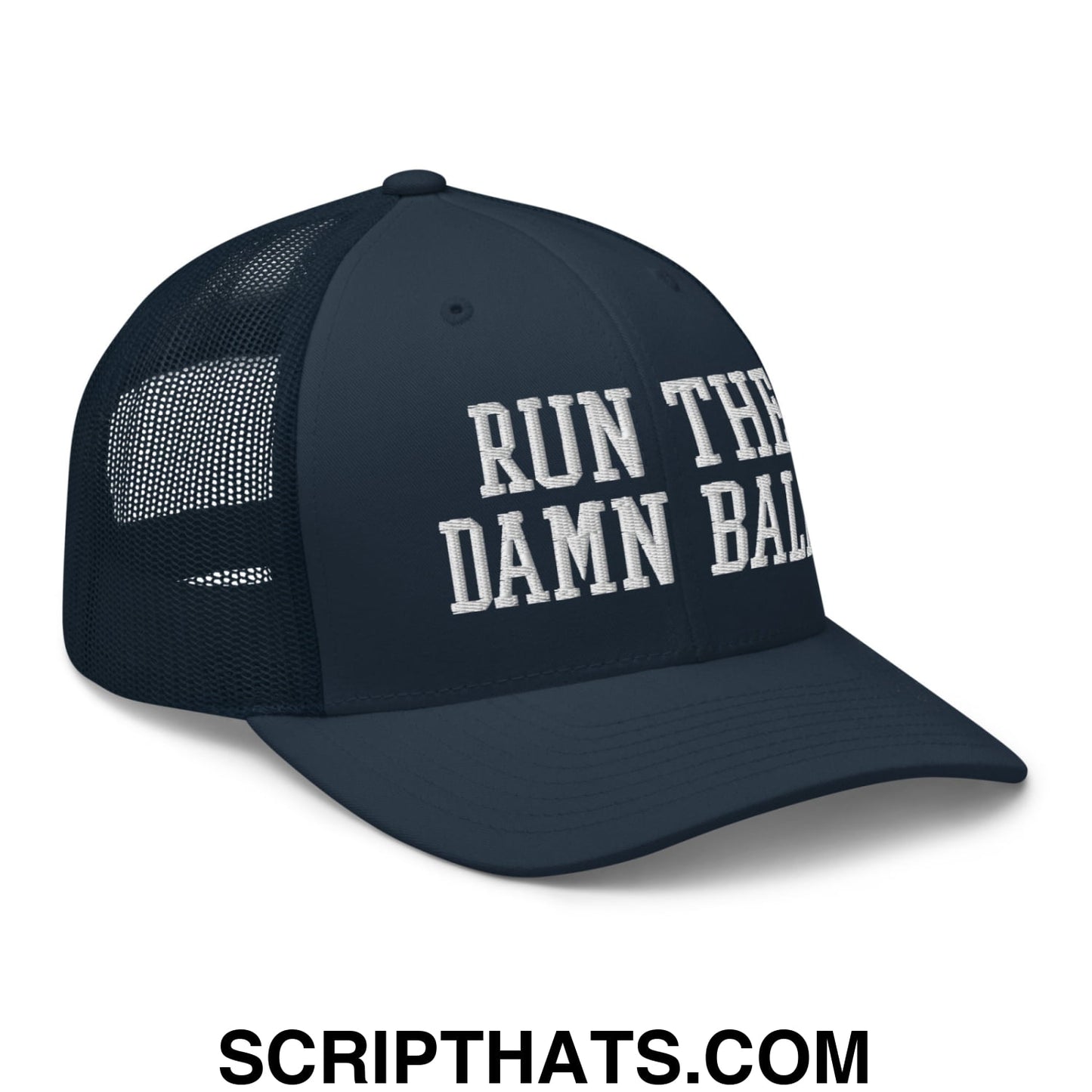 Dark navy blue mesh trucker hat with white embroidered run the damn ball text on the front panel
