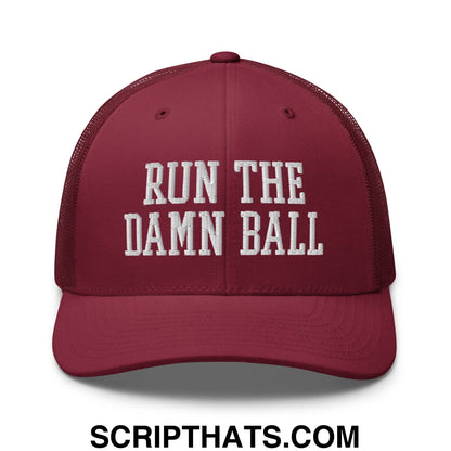 Maroon mesh trucker hat with white embroidered run the damn ball text on the front panel