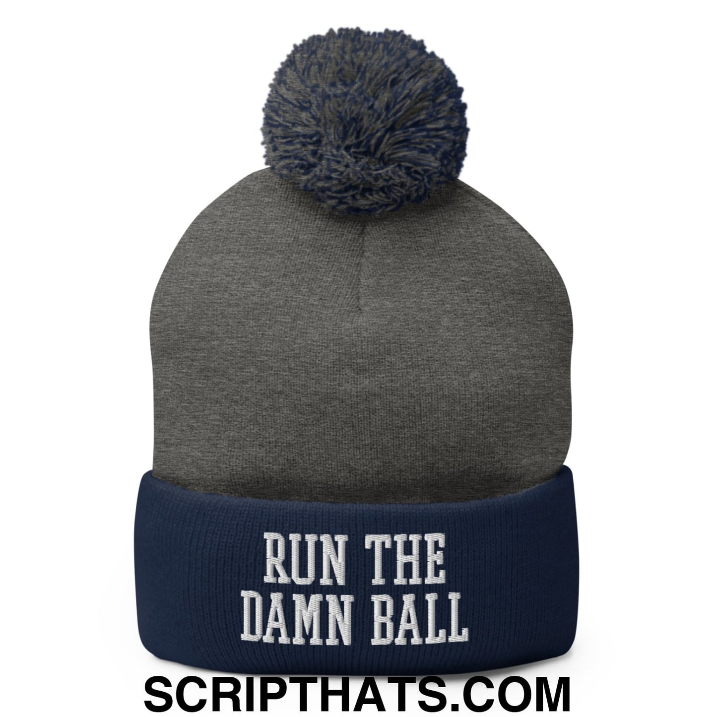 Gray and navy blue knit pom pom beanie with white embroidered run the damn ball text on cuff made for cold weather
