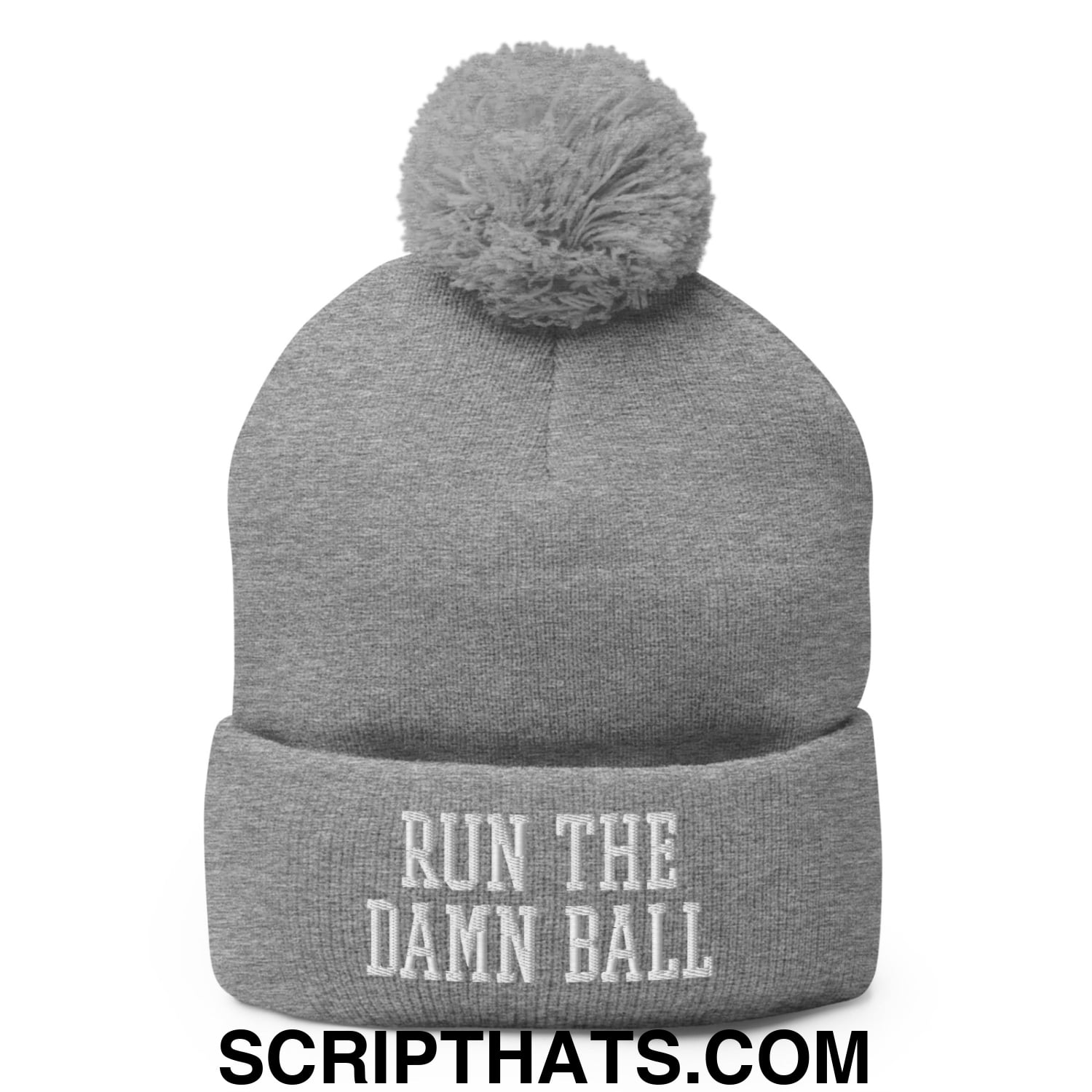 Gray knit pom pom beanie with white embroidered run the damn ball text on the cuff in soft knit material