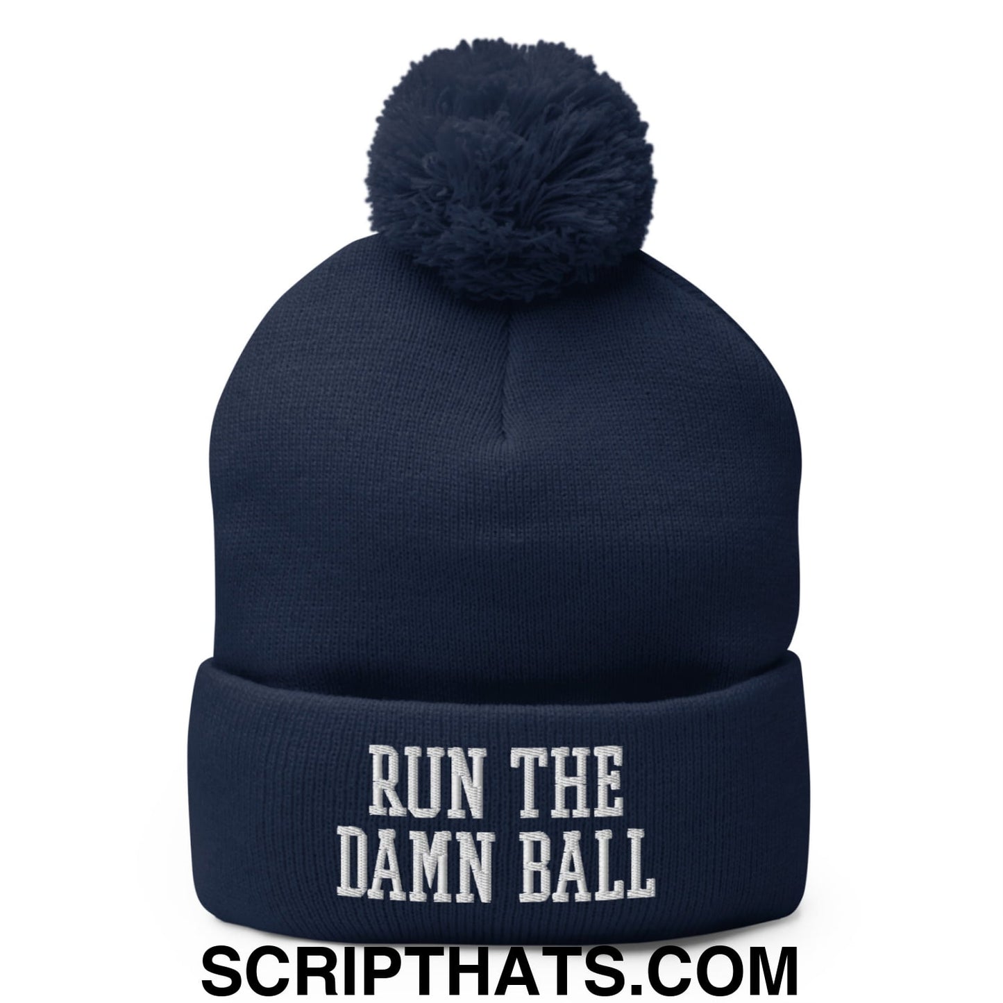 Navy blue knit beanie with matching pom pom and white embroidered run the damn ball text on the cuff