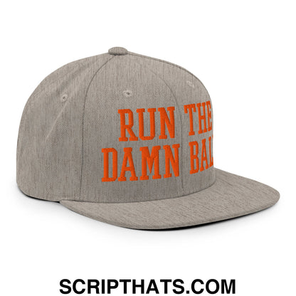 Gray snapback hat with bold orange embroidered text run the damn ball on a flat bill brim design