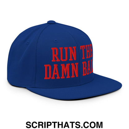 Blue snapback cap with bold red embroidered run the damn ball text and a flat bill brim for casual wear
