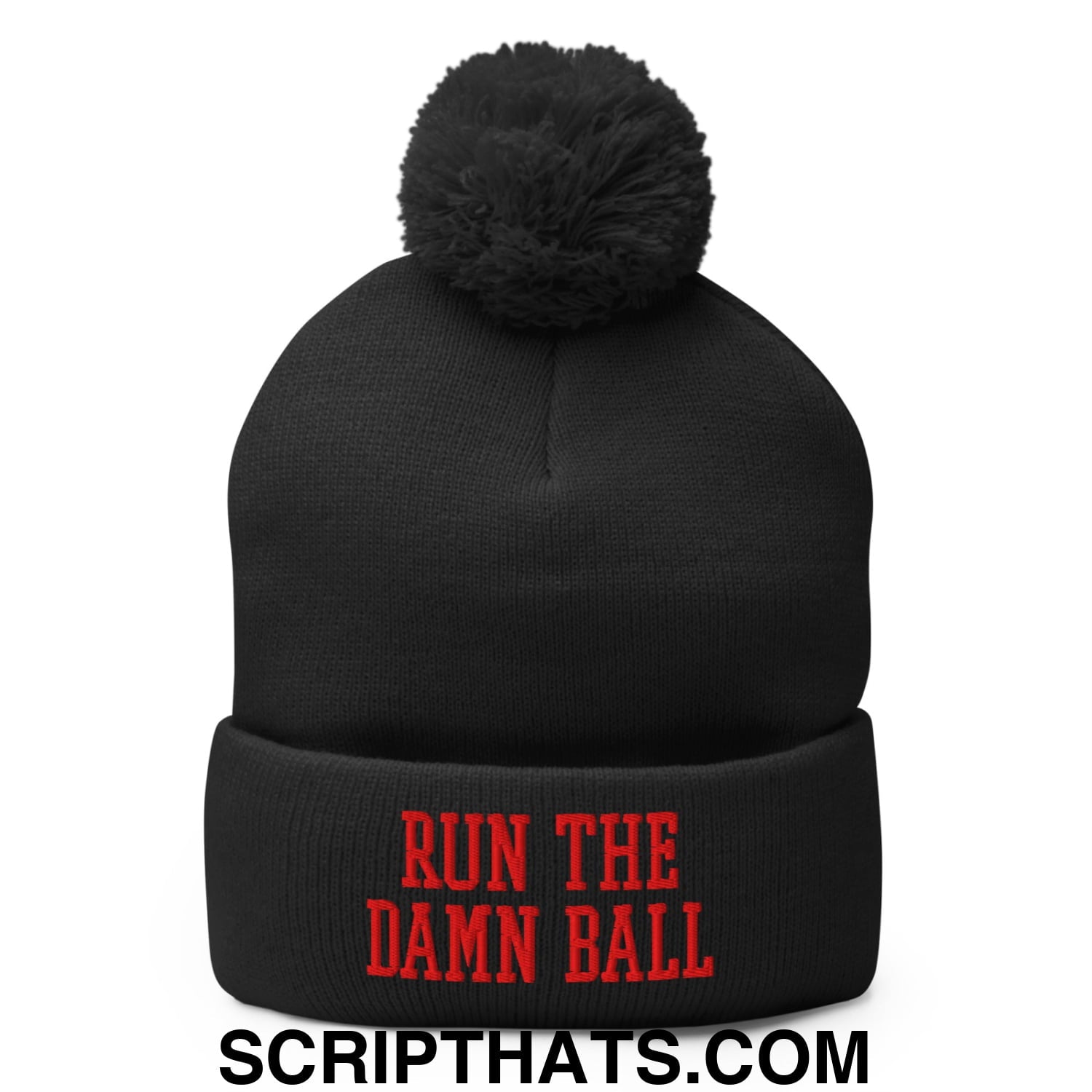 Black knit beanie with fluffy black pom pom and red embroidered run the damn ball text on the cuff