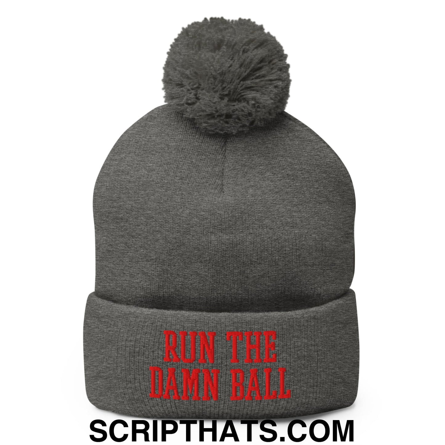 Gray knit beanie with a fuzzy pom pom and red embroidered run the damn ball text on the cuff
