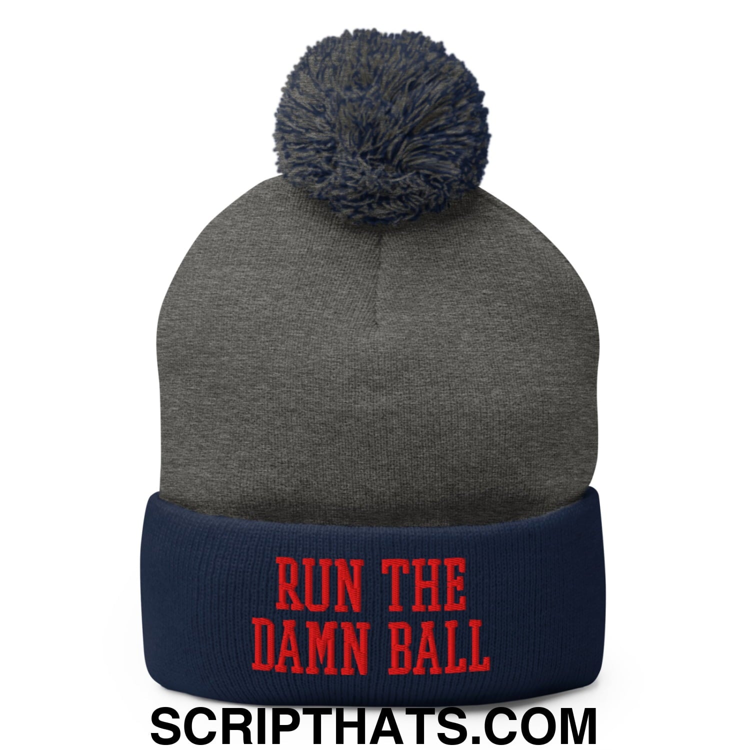 Gray knit beanie with navy blue cuff and pom pom featuring red embroidered text run the damn ball