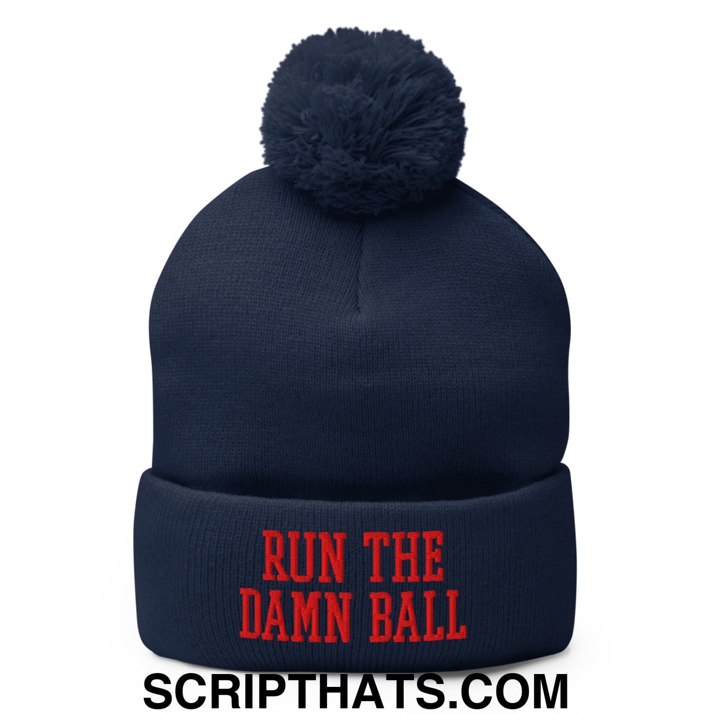 Navy blue knit beanie with matching pom pom and red embroidered run the damn ball text on the cuff