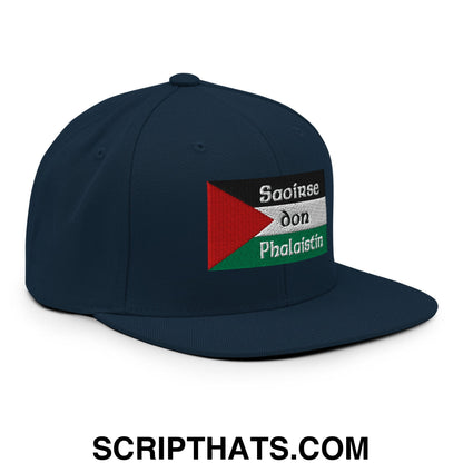 Dark navy blue snapback cap with embroidered palestinian flag patch and text saoirse don phalaistin on front