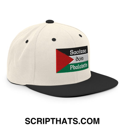 Off-white snapback cap with black brim and embroidered palestinian flag patch reading Saoirse don Phalaistin