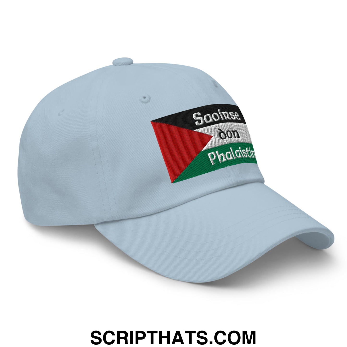 Light blue unstructured dad hat with embroidered palestinian flag and white text saoirse don phalaistin
