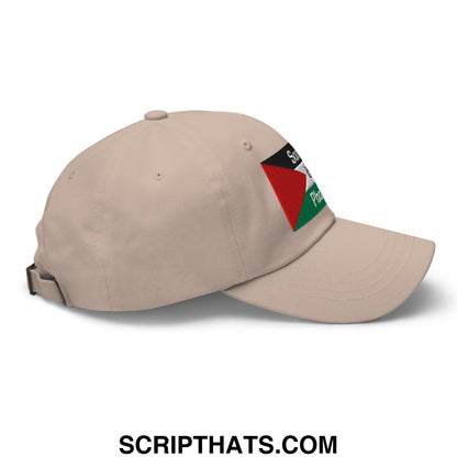 Beige unstructured dad hat featuring an embroidered patch of the Palestinian flag in the Saoirse don Phalaistin design