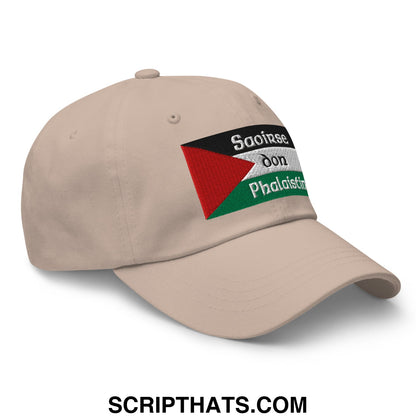 Beige unstructured dad hat featuring an embroidered palestinian flag with white embroidered text saoirse don phalaistin