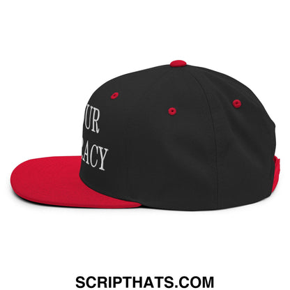 Black and red snapback cap with white embroidered our democracy text on the side flat bill brim design