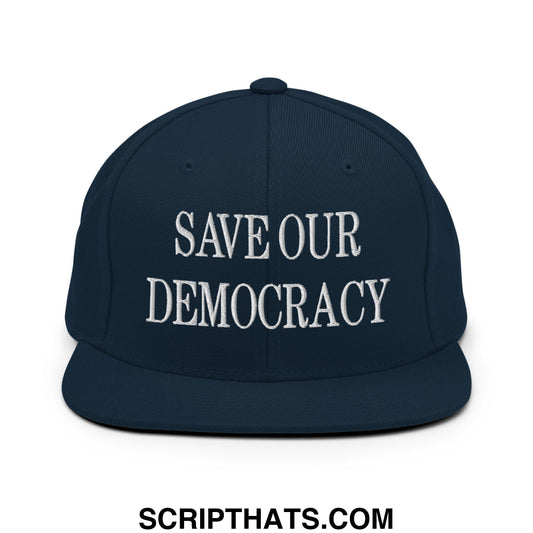 Navy blue snapback hat with white embroidered save our democracy text and flat bill brim for casual wear