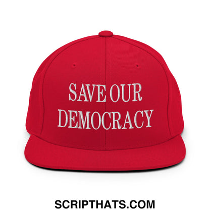 Red snapback flat bill brim hat with white embroidered save our democracy text for casual wear
