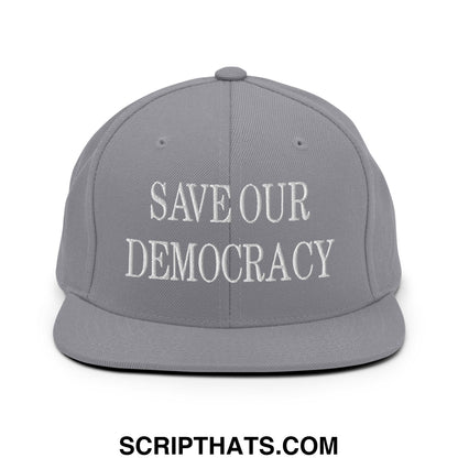 Gray snapback cap with white embroidered save our democracy text and flat bill brim for casual wear