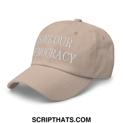 Beige unstructured dad hat with white embroidered save our democracy text for casual wear