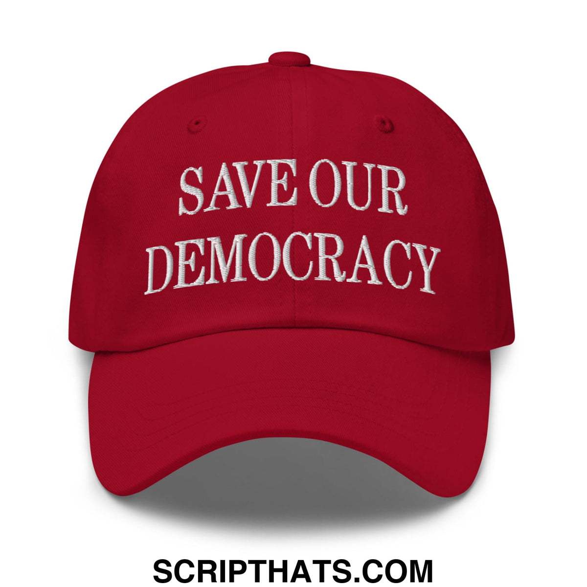 Red unstructured dad hat with white embroidered save our democracy text for casual wear